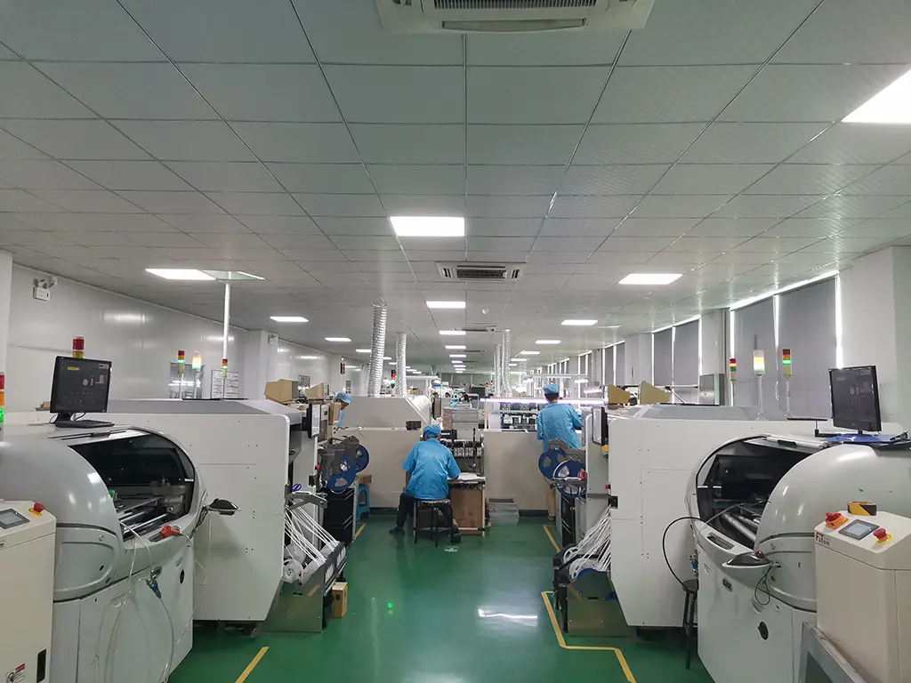 HAOKAI workers assembling camera and microphone modules on a production line