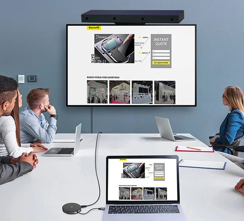 M40 microphone array installed above a conference room display